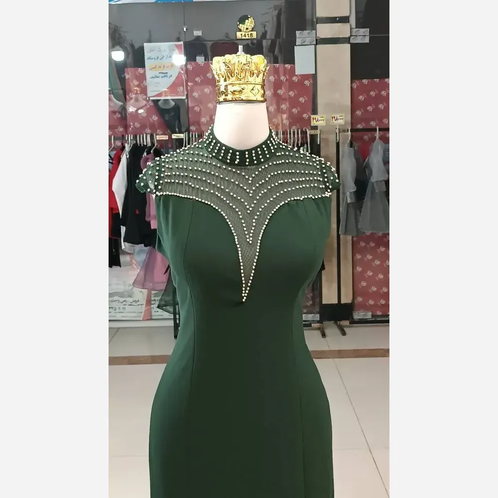 پیراهن بلند زنانه جنس کرپ دالقیچ مدل مروارید رنگ مشکی و سبز قد 150 با کمربند